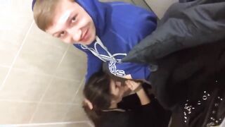 A fellow girl student sucks a member of a student of a Russian college in the men's toilet
